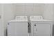 Convenient laundry area featuring a washer and dryer at 2182 Talmai Dr, Snellville, GA 30078