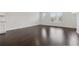 Spacious living room with hardwood floors and natural light at 2182 Talmai Dr, Snellville, GA 30078