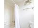 Bathroom featuring a bathtub with a shower curtain, a towel rack, and a toilet at 2614 Princess Se Ln, Marietta, GA 30067