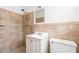 Tiled bathroom featuring a shower, sink, and toilet at 2614 Princess Se Ln, Marietta, GA 30067