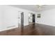 Open living area offers gleaming hardwood floors and seamless access to the kitchen at 2614 Princess Se Ln, Marietta, GA 30067