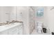 Bright bathroom featuring a vanity with modern fixtures and a shower/tub combination at 350 Westchester Way, Canton, GA 30115