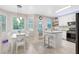 Eat-in kitchen featuring a center island, modern appliances, and plenty of natural light at 350 Westchester Way, Canton, GA 30115