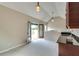Bonus room with a kitchenette, natural light, with access to a deck at 3641 Ridge Towne Dr, Duluth, GA 30096