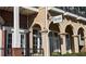 Exterior of 'Break' Coffee Roasters, featuring elegant arched windows and brick accents at 3641 Ridge Towne Dr, Duluth, GA 30096