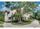 Charming townhome exterior with well-maintained landscaping and mature trees at 3641 Ridge Towne Dr, Duluth, GA 30096