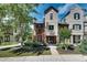 Charming multi-story townhouse with a mix of brick and neutral siding and beautifully landscaped front yard at 3641 Ridge Towne Dr, Duluth, GA 30096