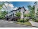 Street view of townhouse exterior with landscaping, stairs, and stone accents at 3641 Ridge Towne Dr, Duluth, GA 30096