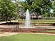 Beautiful water fountain in a park setting with manicured lawns and brick accents at 3641 Ridge Towne Dr, Duluth, GA 30096