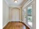 Inviting foyer with hardwood floors and arched doorway at 3641 Ridge Towne Dr, Duluth, GA 30096