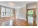 Spacious living area with hardwood floors and access to a deck at 3641 Ridge Towne Dr, Duluth, GA 30096