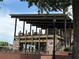 Modern two-story restaurant with outdoor seating, sleek design, and inviting atmosphere at 3641 Ridge Towne Dr, Duluth, GA 30096