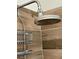 Shower featuring a multi-setting shower head, built in shelf, and pebble tile at 3641 Ridge Towne Dr, Duluth, GA 30096