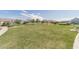 Expansive community green space, with walking paths and benches offering a picturesque view of the neighborhood at 1031 High Tide Ct, Loganville, GA 30052