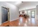 Spacious dining area with hardwood floors, leading into the kitchen and laundry room at 1031 High Tide Ct, Loganville, GA 30052