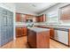 Bright kitchen featuring stainless steel appliances and a center island with a sink at 1031 High Tide Ct, Loganville, GA 30052