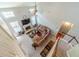 Aerial view of a cozy living room showcases an open floor plan and a warm fireplace at 1031 High Tide Ct, Loganville, GA 30052