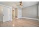 Bedroom boasts gleaming hardwood floors, neutral paint, and closet space perfect for a serene retreat at 1156 Piedmont Ne Ave # B3, Atlanta, GA 30309