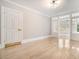 Spacious living room with hardwood floors and white doors at 1156 Piedmont Ne Ave # B3, Atlanta, GA 30309