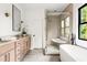 Luxurious bathroom features double vanities, soaking tub and walk-in shower at 2745 S Bamby Ne Ln, Brookhaven, GA 30319