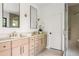 Bright bathroom with double vanity sinks, and glass-enclosed walk-in shower at 2745 S Bamby Ne Ln, Brookhaven, GA 30319