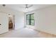 Bright, airy bedroom with hardwood floors, and a large window at 2745 S Bamby Ne Ln, Brookhaven, GA 30319
