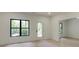 Bright bedroom with hardwood floors, white walls, large windows and a balcony at 2745 S Bamby Ne Ln, Brookhaven, GA 30319