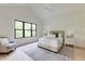 Stylish bedroom with large windows, vaulted ceiling, a ceiling fan and modern decor at 2745 S Bamby Ne Ln, Brookhaven, GA 30319