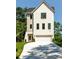 Attractive new construction home featuring a brick facade, two-car garage and manicured lawn at 2745 S Bamby Ne Ln, Brookhaven, GA 30319