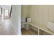 Inviting hallway features bench seating and stairs leading to the upper level at 2745 S Bamby Ne Ln, Brookhaven, GA 30319