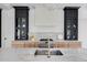 Gourmet kitchen featuring high-end appliances, custom cabinetry, and marble countertops at 2745 S Bamby Ne Ln, Brookhaven, GA 30319