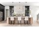 Spacious kitchen with large island, sleek cabinetry, pendant lighting, and stainless-steel appliances at 2745 S Bamby Ne Ln, Brookhaven, GA 30319