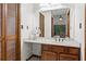 Bathroom featuring a vanity with storage, solid surface countertop, and neutral color scheme at 895 Fawn Way, Marietta, GA 30068