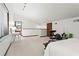 Spacious bedroom area featuring a vaulted ceiling, built-in desk, and ensuite bathroom at 895 Fawn Way, Marietta, GA 30068