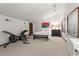 Bright bedroom with vaulted ceiling, exercise equipment, and natural light at 895 Fawn Way, Marietta, GA 30068