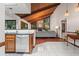 Bright living room area with stone fireplace, hardwood floors and vaulted wood ceiling at 895 Fawn Way, Marietta, GA 30068