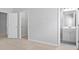 Bedroom with ensuite bathroom featuring a modern vanity and framed mirror at 1838 Lakeview Bend Way, Buford, GA 30519