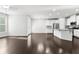 Open concept living and kitchen area with stainless steel appliances and island at 1838 Lakeview Bend Way, Buford, GA 30519