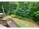 Backyard view from deck showcasing the lush greenery at 223 Oak Grove Dr, Dallas, GA 30157