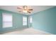 Inviting bedroom featuring a ceiling fan and well lit with natural light at 223 Oak Grove Dr, Dallas, GA 30157