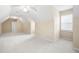 Bonus room featuring carpet flooring, a ceiling fan, and a window at 223 Oak Grove Dr, Dallas, GA 30157