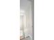 Hallway featuring an open doorway and white trim at 223 Oak Grove Dr, Dallas, GA 30157