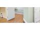 Spacious laundry room with an open doorway and white trim at 223 Oak Grove Dr, Dallas, GA 30157