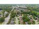 Picturesque aerial view of a neighborhood featuring lush greenery, well-maintained homes, and convenient access to amenities at 3032 Montclair Se Cir, Smyrna, GA 30080