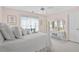 Charming bedroom with light pink walls, a white bed and vanity with a lace curtain at 3032 Montclair Se Cir, Smyrna, GA 30080