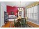 Cozy dining room features a round table, chandelier, and unique decor accents at 3032 Montclair Se Cir, Smyrna, GA 30080