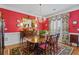 Formal dining room features a wooden table, china cabinet, and elegant decor at 3032 Montclair Se Cir, Smyrna, GA 30080