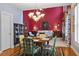 Cozy dining room features a round table, chandelier, and unique decor accents at 3032 Montclair Se Cir, Smyrna, GA 30080