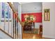 Elegant dining room with red wallpaper, chandelier, and hardwood floors at 3032 Montclair Se Cir, Smyrna, GA 30080