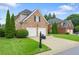 Attractive brick home with a two-car garage and mature landscaping at 3032 Montclair Se Cir, Smyrna, GA 30080